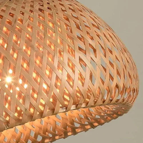 Close-up of the bamboo weave lit from inside, showing the diamond pattern